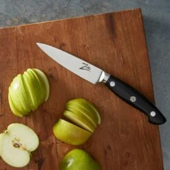 Executive-Plus Serie 4,25" Schälmesser 61 HRC Edelstahl 11 Executive-Plus Serie 4,25" Schälmesser 61 HRC Edelstahl -Haushaltsgeräte Store 10039010 de 0004 logo